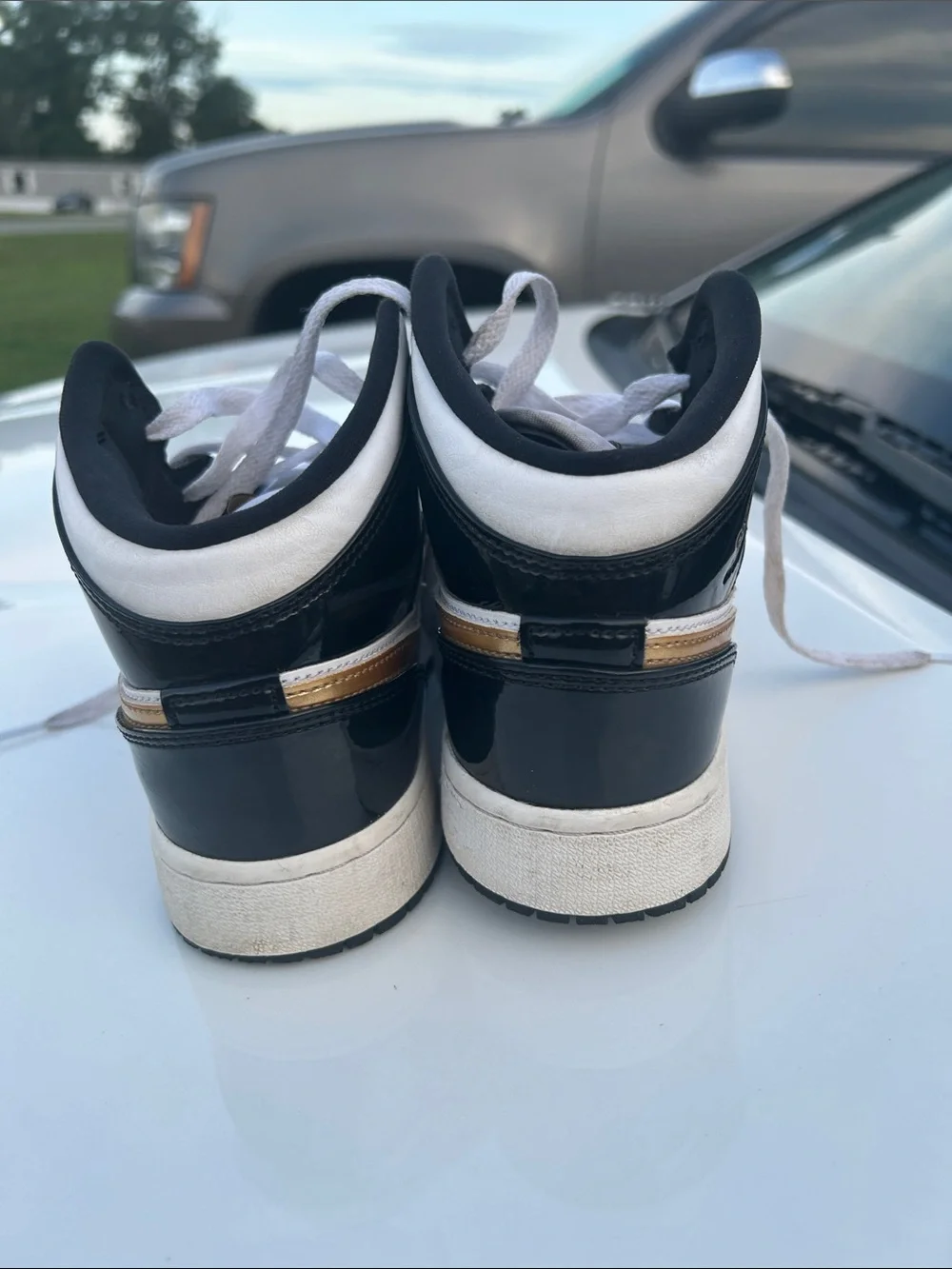 Nike Black White Gold Jordan Ones Sneakers